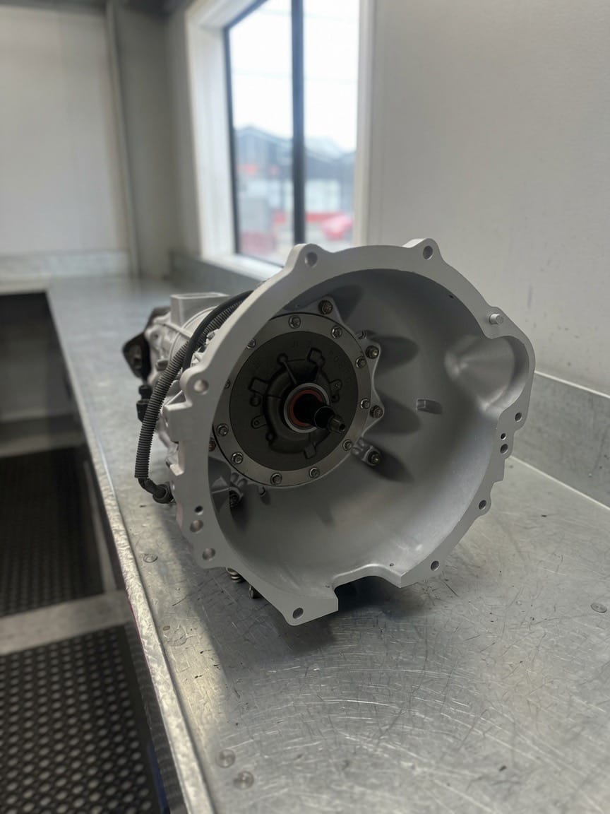 Close-up of the bellhousing face of a rebuilt automatic transmission